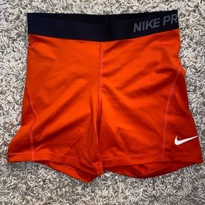 Orange Nike pro spandex